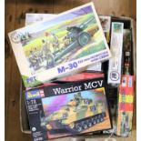 20x unmade military plastic kits by Revell, Airfix, Fujimi, Hasegawa, etc. In 1:76, 1:72, etc