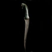 An Indian dagger pesh kabz. Recurved T-section 19th century wootz SE blade 22cms with some gold