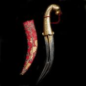 An Indian dagger jambiya. Curved DE blade 19cms, nicely gold damascened at forte en suite with the