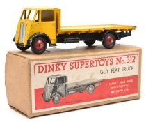 A Dinky Supertoys Guy Flat Truck (512). Example with yellow first type cab and body, black chassis