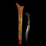 A Balinese ceremonial knife from Buleleng. 20th century, swollen SE blade 24.5cms with brass