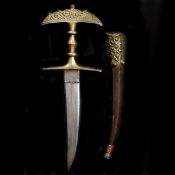 An Indian dagger jamdhar katari from the Hindu Kuch. 19th century, curved double edge blade 19.5cms,