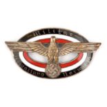 A Third Reich oval enamelled pin back badge for the German Administration in Norway, having an eagle