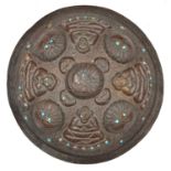 A Tibetan or North Indian border copper shield. 20th century, embossed with 4 seated buddha-like