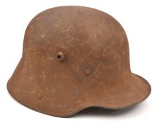 A German M16 steel helmet, with leather lining. QGC (externally rusted overall, the lining worn