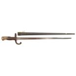 A French M1874 Gras bayonet, d 1876 on backstrap, in scabbard, with matching nos 34506. GC, a good
