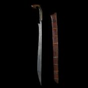 A Sumatran sword kalisan. 19th century, straight swollen SE blade 46cms, buffalo horn hilt sukul