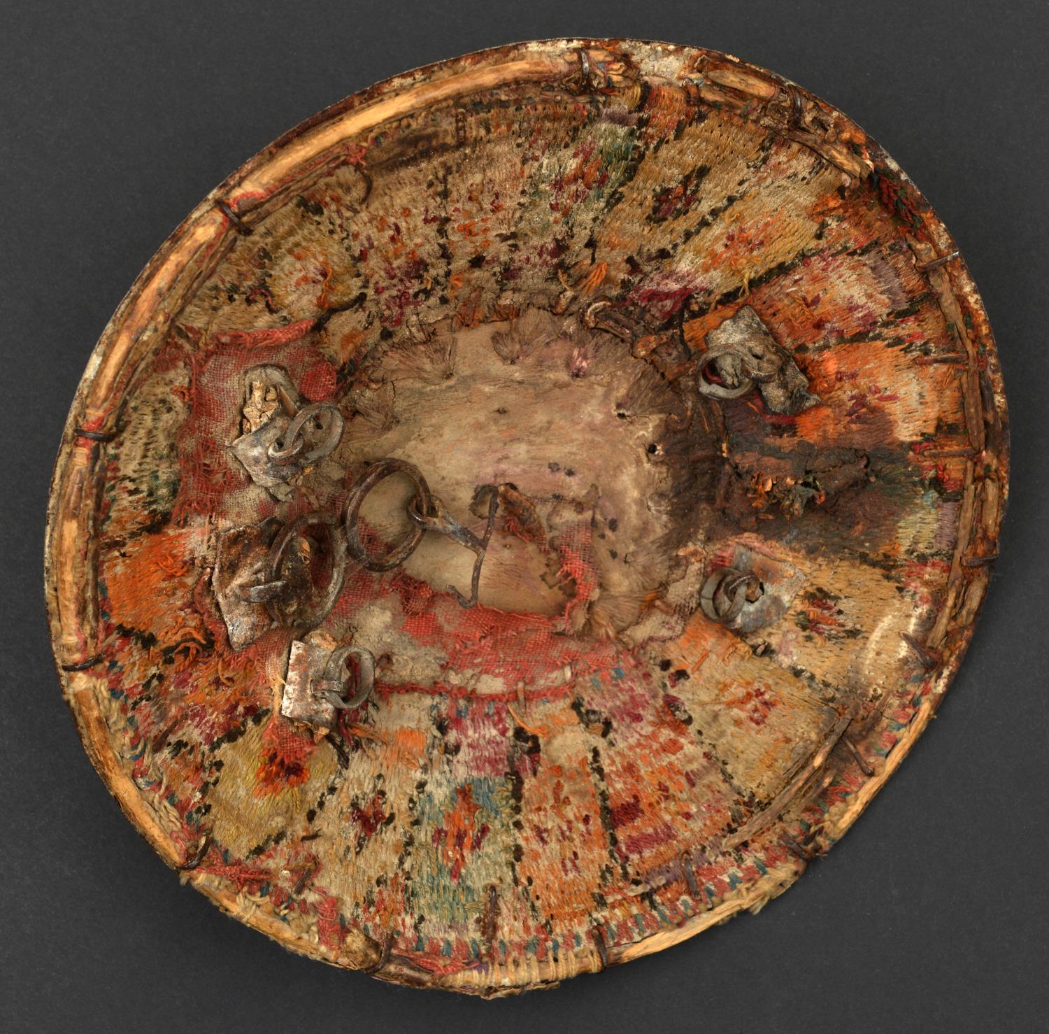 An Ottoman shield kalkan. Probably 18th or 19th century, 27cms, made from cane wound with coloured - Image 2 of 3