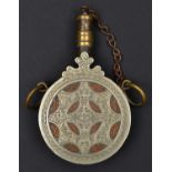 A Moroccan powder flask of cylindrical form. 20th century, 16.5cms made from copper, brass and