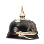 An 1886 pattern Bavarian police officer's pickelhaube, with WM badge and mounts, including cruciform