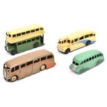 4 Dinky Toys buses. 29b, Streamlined bus in two-tone green. 29c, Double Decker bus in cream and