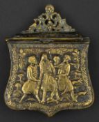 A Greek cast brass cartouche palaska.19th century, 10cms, the front with a relief scene of