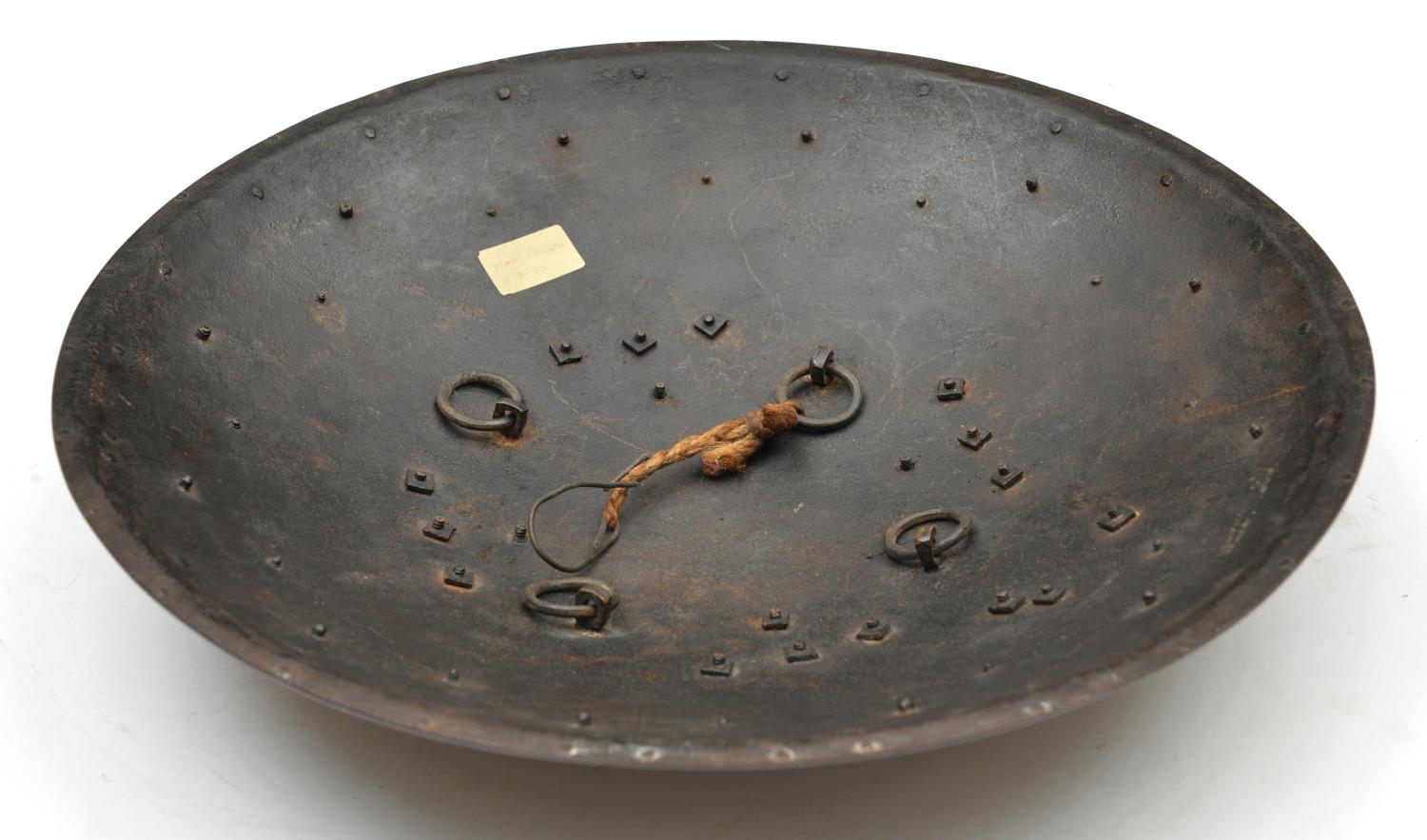An Indian iron shield dhal. Late 19th century, probably Sialkot, 35.5cms fitted with 4 iron - Image 3 of 3