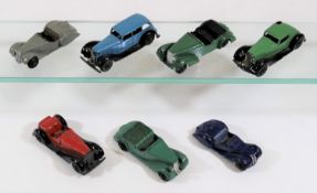 7 Dinky Toys. 36b, Bentley sports car in green. 36e, British Salmson 2-seater sports car in red.