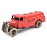 A Dinky Toys petrol tanker (25d). A post-war example in red with pre-war black base plate and