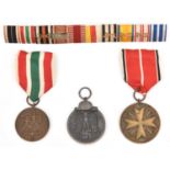 Three Third Reich medals: Order of the German Eagle bronze medal of Merit without swords, Return