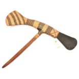 A Polynesian axe, grey stone head and long basket weave axe head shaped tail, 29" overall, on