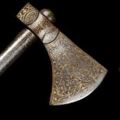 An Ottoman Turkish axe. 19th century, iron head with 8.5cms crescent edge, covered with gold