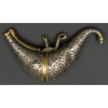 A Persian powder flask. Qjar dynasty, 15cms, bird-shaped tinned brass body applied with a