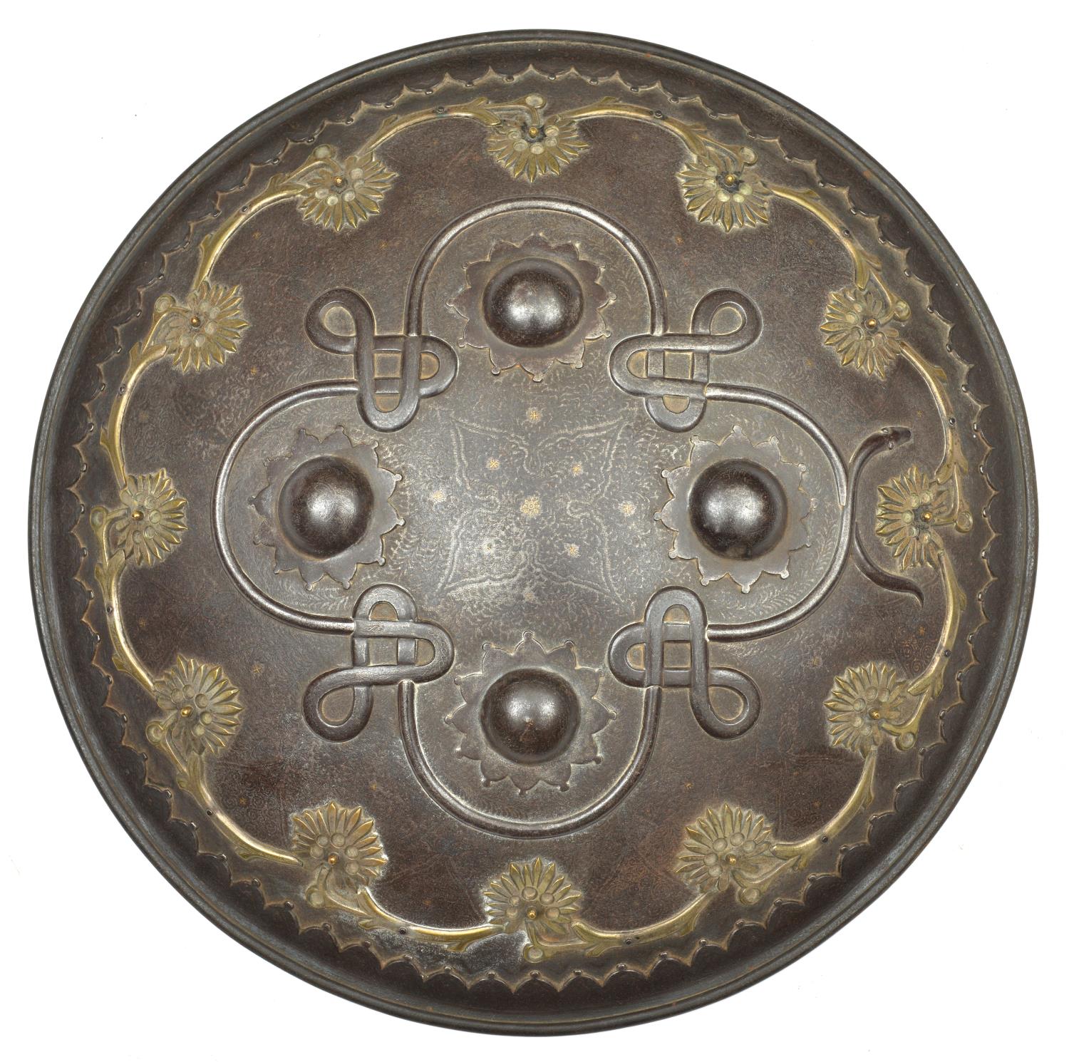 An Indian iron shield dhal. Late 19th century, probably Sialkot, 35.5cms fitted with 4 iron