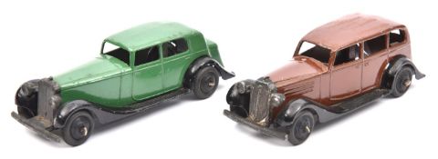 2 Dinky Toys. 30c, Daimler in green. 30d, Vauxhall in brown. Both with ridged black wheels and