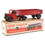 A Dinky Supertoys Bedford Articulated Lorry (521). Example with red cab and body, and black wings