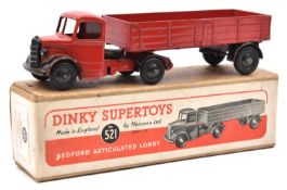 A Dinky Supertoys Bedford Articulated Lorry (521). Example with red cab and body, and black wings