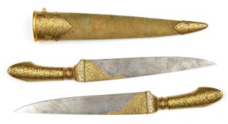 An Indian double dagger. Skilfully made as 2 daggers slotting together to form a single dagger,