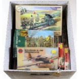 20x unmade military plastic kits by Revell, Airfix, Fujimi, etc. In 1:76, 1:72, etc scales.