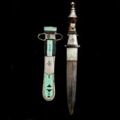 A North African tribal knife. Straight DE blade 16cms, wooden hilt and leather sheath with good