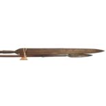 A Masai lion spear, leaf shaped blade 9", flared socket, slender darkwood haft 67" overall, and