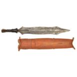 An African Salampasu head hunter's tribal knife. Early 20th century, broad DE blade 42.5cms,