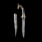 An Indian dagger khanjar. Serrated pattern watered blade 15cms, steel hilt with horse?s head
