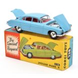 A Corgi Toys Jaguar Mark X (238). With light blue body and red interior. Including suitcase and