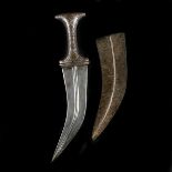 An Indian dagger jambiya. Probably Hyderabad 19th century, broad curved DE blade 20cms with raised