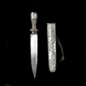 A Tibetan dagger. 20th century, straight single edge blade 19cms, nickel pommel and sheath