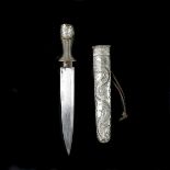 A Tibetan dagger. 20th century, straight single edge blade 19cms, nickel pommel and sheath