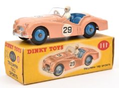 A Dinky Toys Triumph TR2 Sports. 111. Salmon pink body, blue interior and wheels, RN 29. White