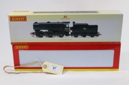 2 Hornby Railways tender locomotives. A BR class Q1 0-6-0 RN33009 (R2344) in unlined black weathered