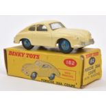A Dinky Toys Porsche 356A Coupe. 182. An example with cream body and blue wheels. Boxed, some
