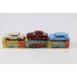 3 Dinky Toys. Morris 1100 (140) in light blue with red interior. Volkswagen 1500 (144) in cream with