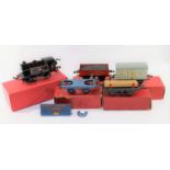 Hornby O Gauge Type 40 Clockwork BR 0-4-0 Tank Locomotive. In red/white lined gloss black livery, RN