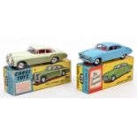 2 Corgi Toys. Jaguar Mark X (238). Example in light metallic blue with red interior. Complete with