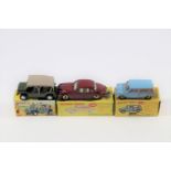 3 Dinky Toys. Jaguar 3.4 Saloon (195) in maroon with cream interior. An Austin Seven Countryman (