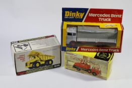 3 Dinky Toys. Aveling-Barford 'Centaur' Dump Truck (924) example in orange and yellow livery. Plus a