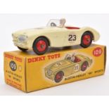 Dinky Toys Austin Healey 100 Sports. 109. Cream body, with red interior and wheels. RN 23. White