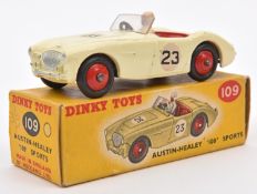 Dinky Toys Austin Healey 100 Sports. 109. Cream body, with red interior and wheels. RN 23. White