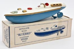 Sutcliffe tinplate single hulled Bluebird clockwork Speed Boat. In white and light blue, with gold