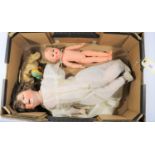 2 dolls and a clockwork monkey. A German doll by Revalo, 22-12. With a ceramic head, composite body,