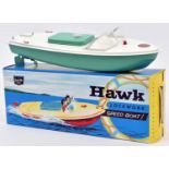 Sutcliffe tinplate clockwork Speed Boat. Named 'HAWK' in white and light green, with light green